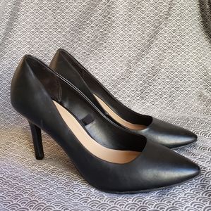 Black pointed toe heels